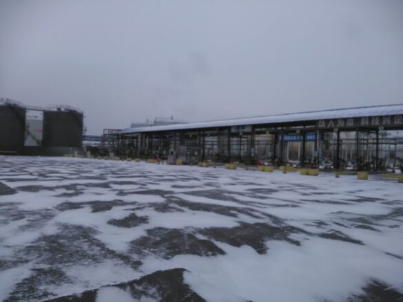 Large storage tanks of pentane, hexane and heptane in the ice and snow overlooking from the Office Large storage tanks of pentane, hexane and heptane in the ice and snow overlooking from the Office
