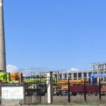 Hydrotreating reactor with catalysts being activated, symbolizing the sulfiding process that converts metal oxides into active sulfides for HDS and HDN reactions.