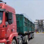 Freight trucks loading drums of n-Hexane at our factory for delivery across Belarus.