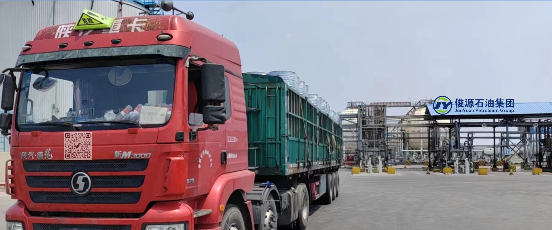 Freight trucks loading drums of n-Hexane at our factory for delivery across Belarus.